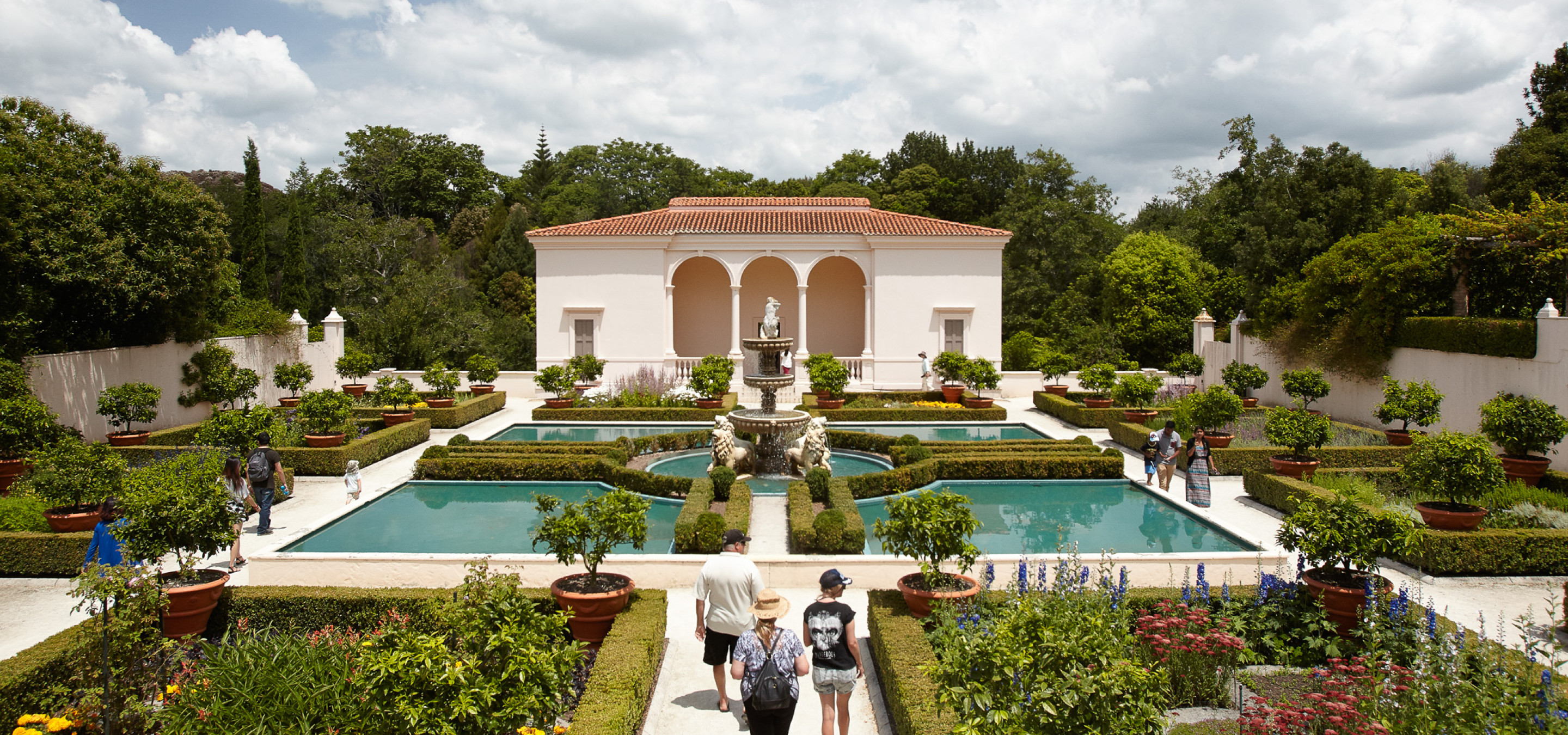 The formal Italian Renaissance garden at Hamilton Gardens, Hamilton, features a classical building, fountains, and reflecting pools.