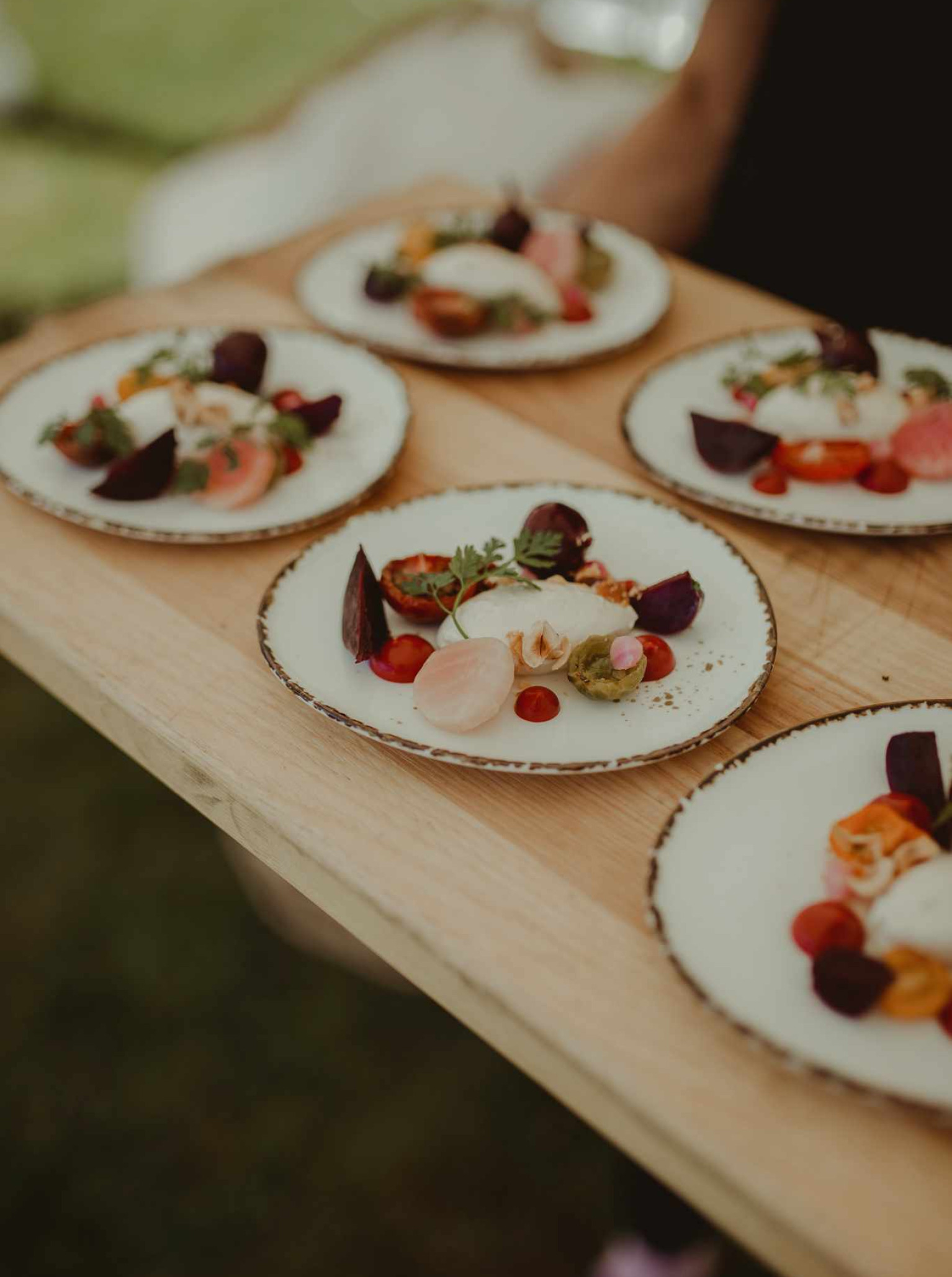 Source Kitchen, Auckland, presents beautifully plated, seasonal fine dining, reflecting their bespoke catering style.