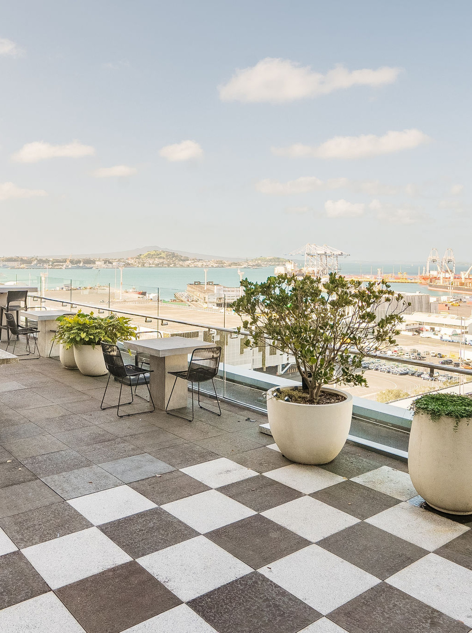 This modern, stylish rooftop terrace at Britomart Place by Precinct Flex, Auckland, overlooks the Waitematā Harbour.