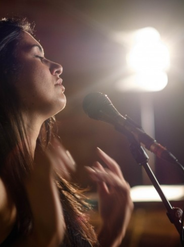 Māori jazz artist Allana Goldsmith passionately performs on stage in Auckland.