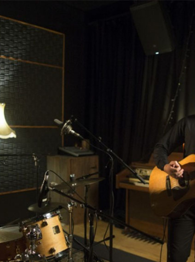 Auckland's Goody 2 Shoes acoustic band performs in an intimate studio with sound-absorbing walls.