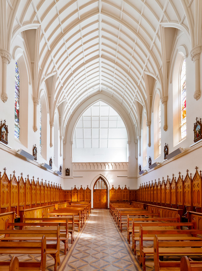 Erskine Chapel in Wellington showcases its French Gothic interior with a soaring vaulted ceiling and elegant stained glass.