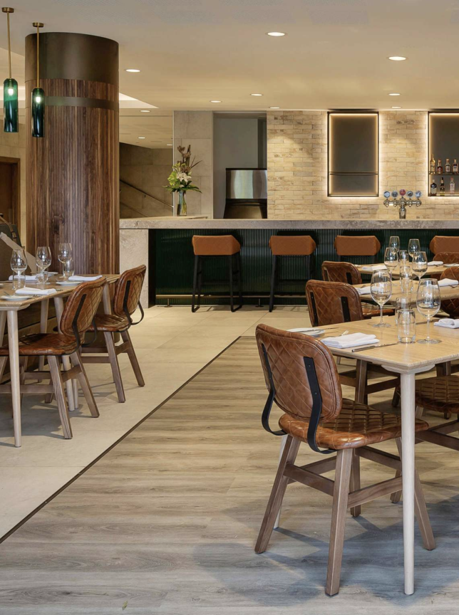 The elegant, contemporary dining room and bar at Pullman Rotorua blends modern design with local inspiration.