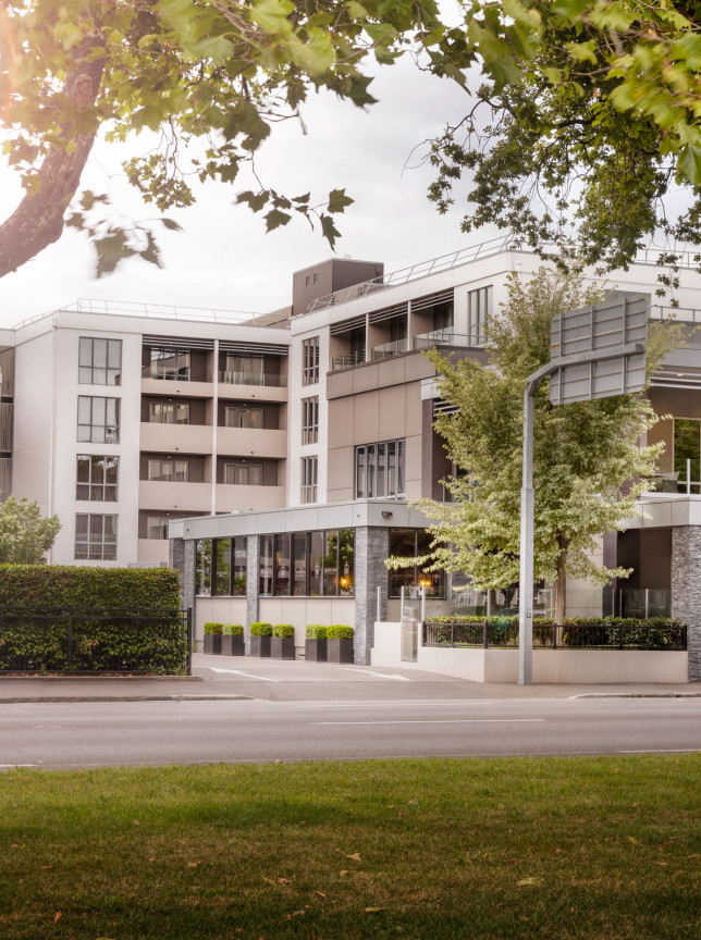 The modern, contemporary Kiwi-designed exterior of Rydges Latimer Christchurch hotel, seen from the street.