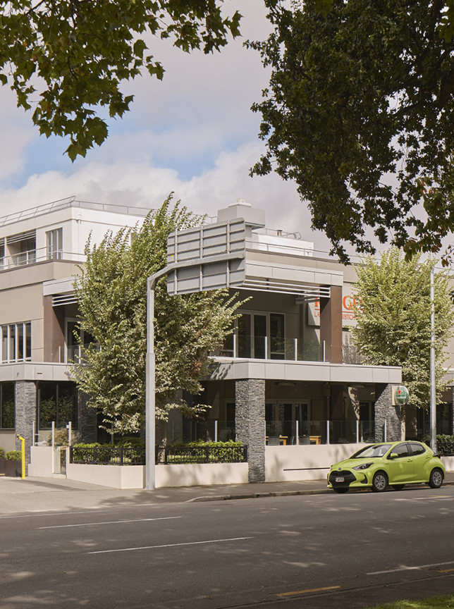 A modern, multi-story hotel exterior showcasing the contemporary Kiwi design of Rydges Latimer Christchurch.