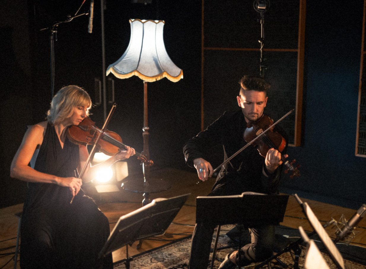 Auckland's The Black Quartet, a modern string ensemble, performs in a stylish, intimate studio setting.