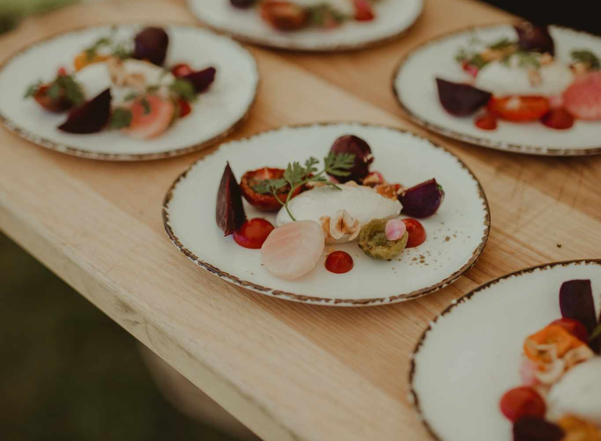 Source Kitchen, Auckland, presents beautifully plated, seasonal fine dining, reflecting their bespoke catering style.
