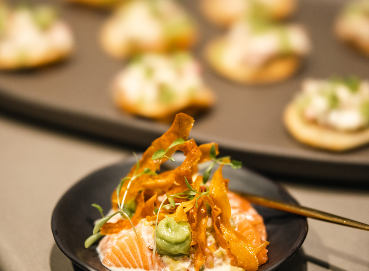 A beautifully plated salmon canapé, showcasing LittleWolf Auckland's innovative, restaurant-quality catering and exceptional presentation.