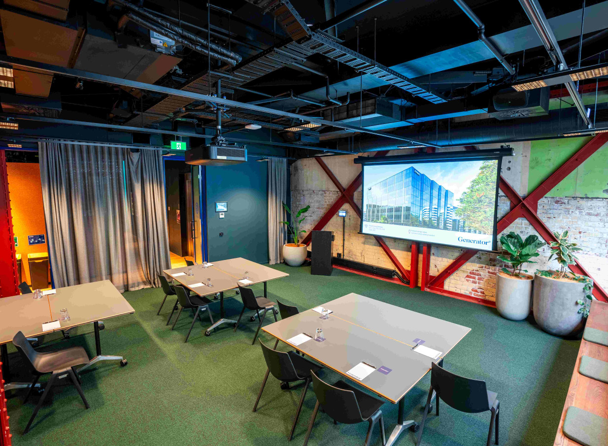 A flexible, industrial-chic meeting room with exposed brick and beams at 30 Waring Taylor St by Precinct Flex in Wellington.