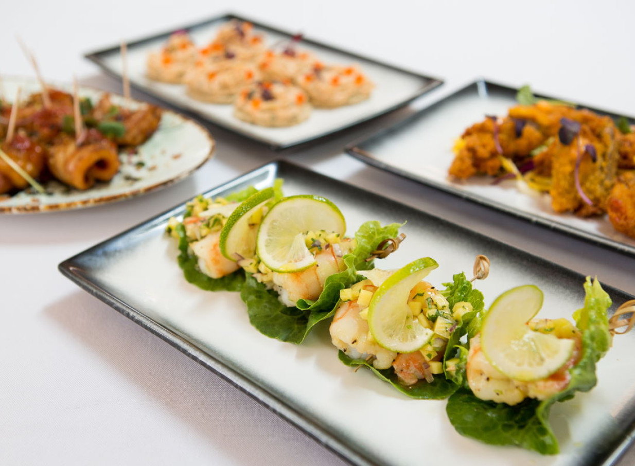 Elegant canapés, showcasing contemporary Kiwi cuisine, are artfully presented at Abel Estate, a stylish Auckland venue.