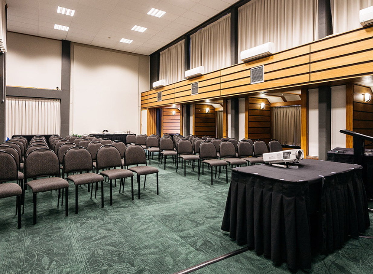 The purpose-built conference room at Palmy Conference + Function Centre, Palmerston North, features a theatre-style setup and modern amenities.