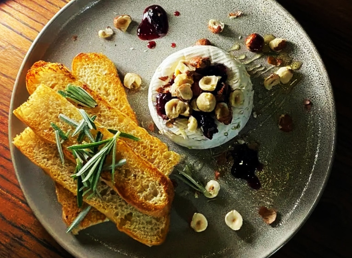 Gourmet cheese with nuts and toast, a scrumptious bite from Auckland's Parisian-inspired 39 Ponsonby.