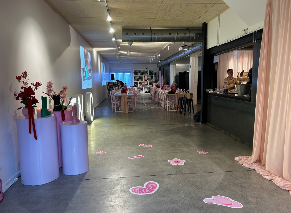 The industrial-chic Space On Crummer in Auckland transformed into a pink-themed event with a dining area and bar.