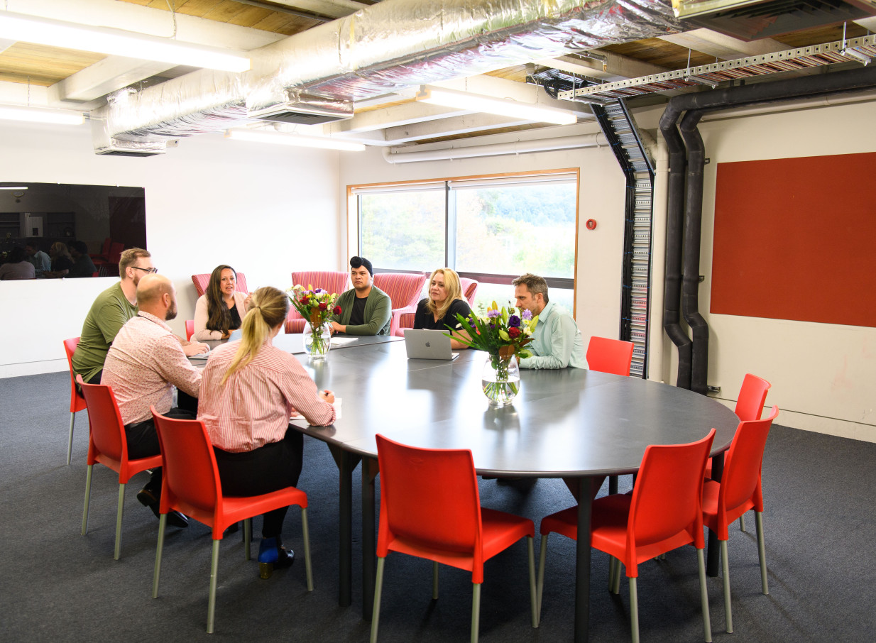 A collaborative meeting in Whirinaki Whare Taonga's bright, contemporary meeting room in Wellington.