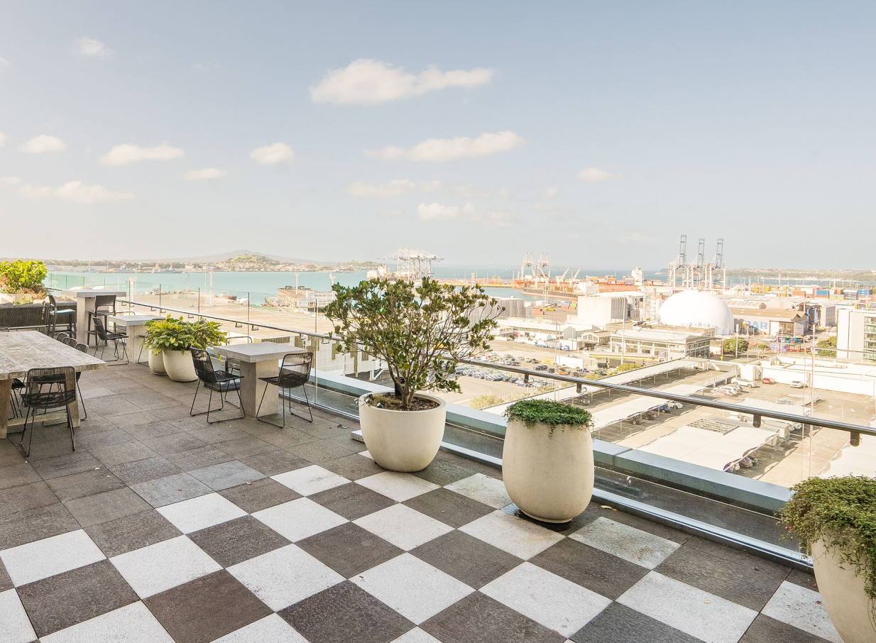 This modern, stylish rooftop terrace at Britomart Place by Precinct Flex, Auckland, overlooks the Waitematā Harbour.