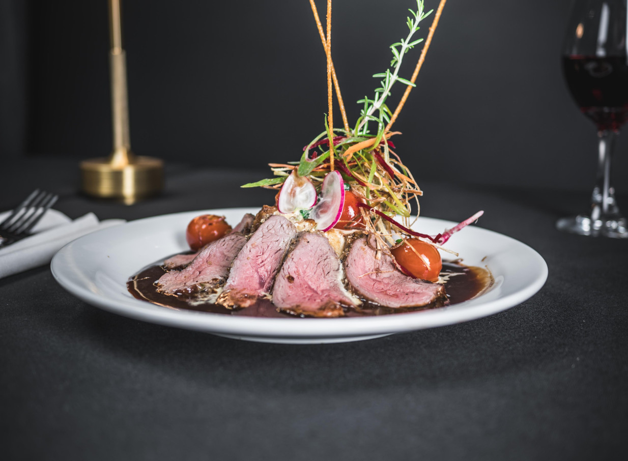 An elegantly presented modern New Zealand dish at Wharfside Function Centre, Auckland, embodying its refined waterfront dining.