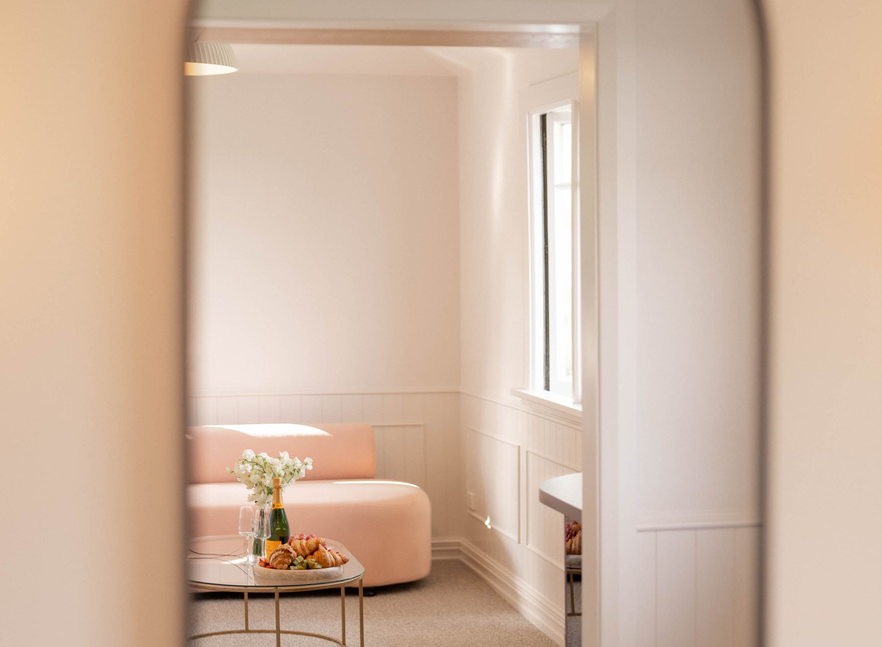 A chic, light-filled contemporary bridal room at The Hilltop x 5th Street, Christchurch, complete with champagne and pastries.