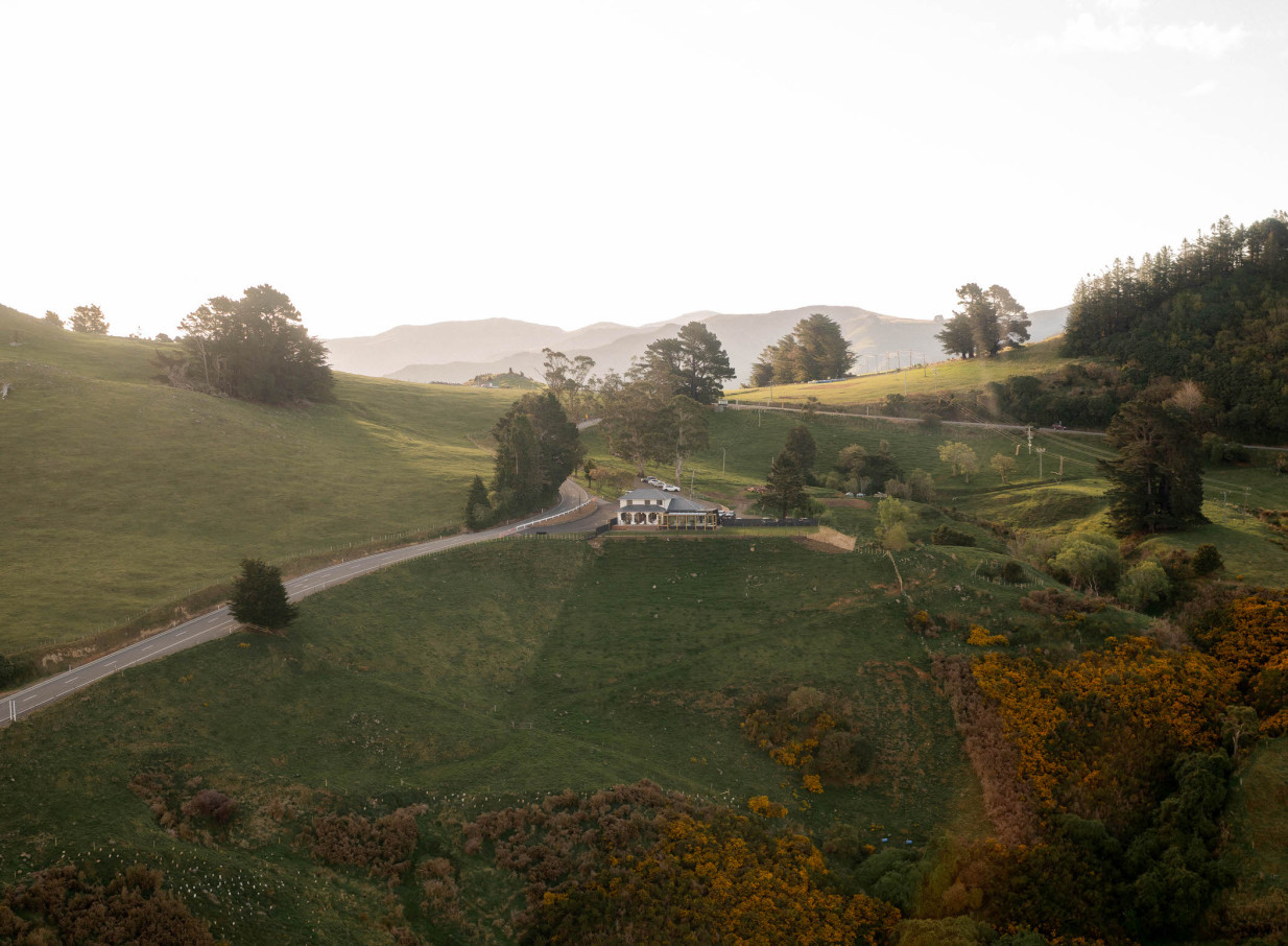 Aerial view of The Hilltop, a Christchurch venue showcasing historic charm and modern elegance on a scenic hilltop.