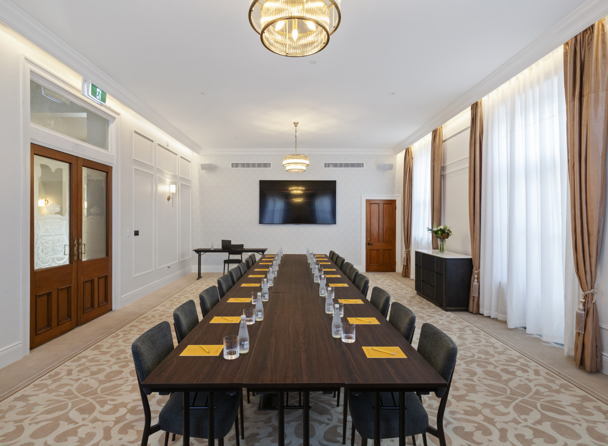 An elegant conference room at The Clements Hotel, Waikato, showcasing Beaux-Arts grandeur blended with modern luxury.