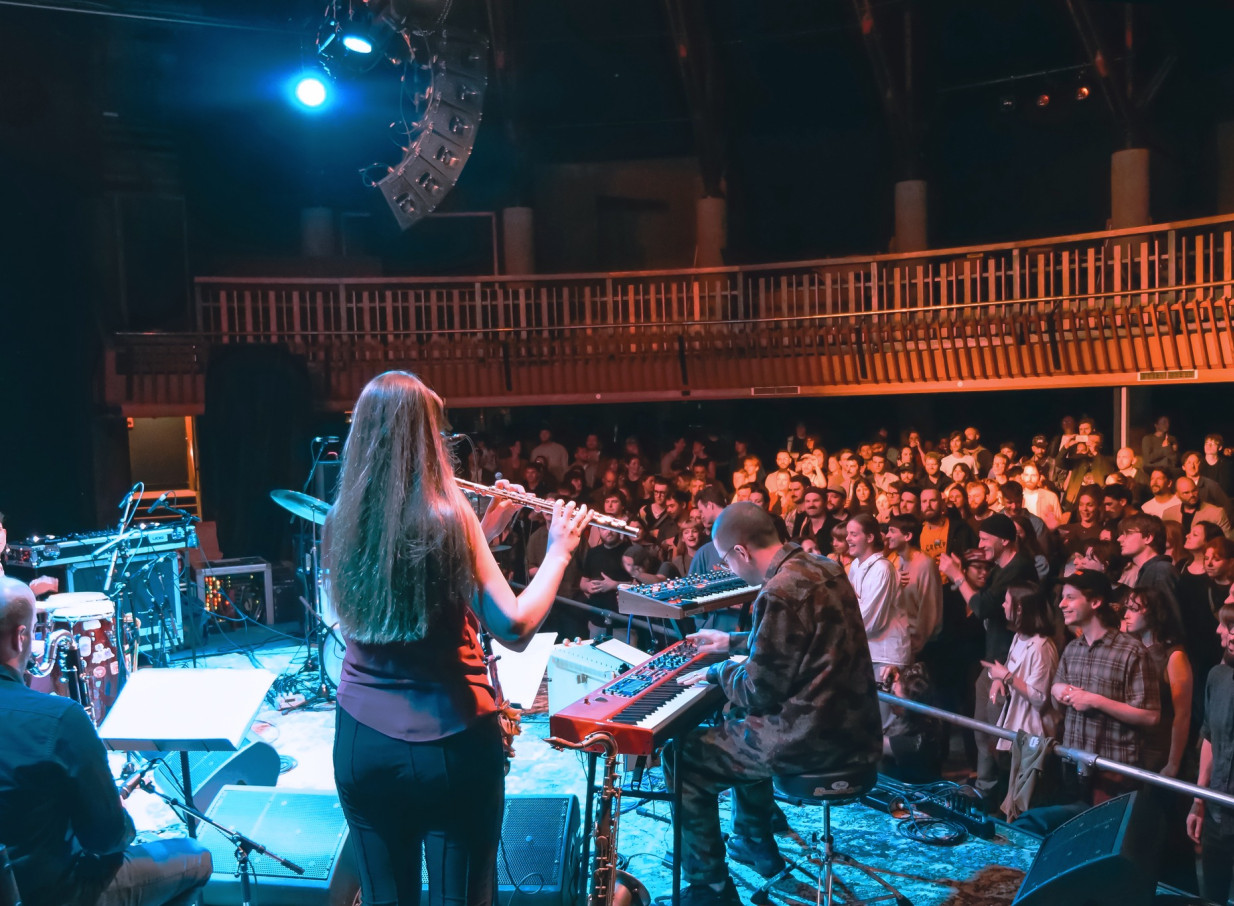 A live music performance engages the crowd at Meow Nui, a Wellington venue housed in a transformed 1990 Citadel church.