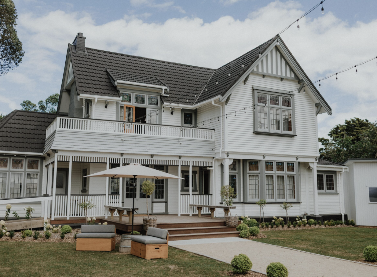 An outdoor event space with seating and string lights at the historic Tatum homestead in Manawatū-Whanganui.