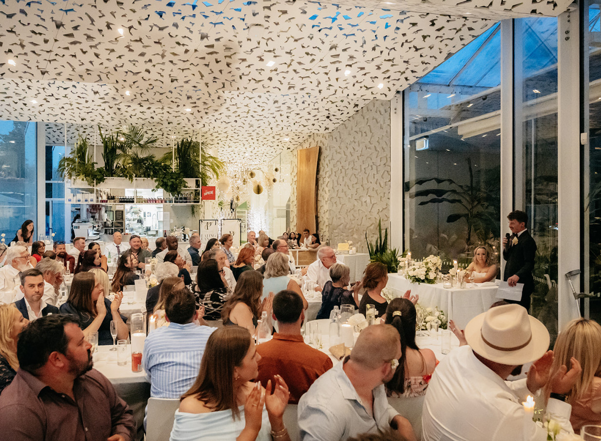 A modern reception with high ceilings and large windows at ilex, a contemporary architectural venue in Christchurch Botanic Gardens.