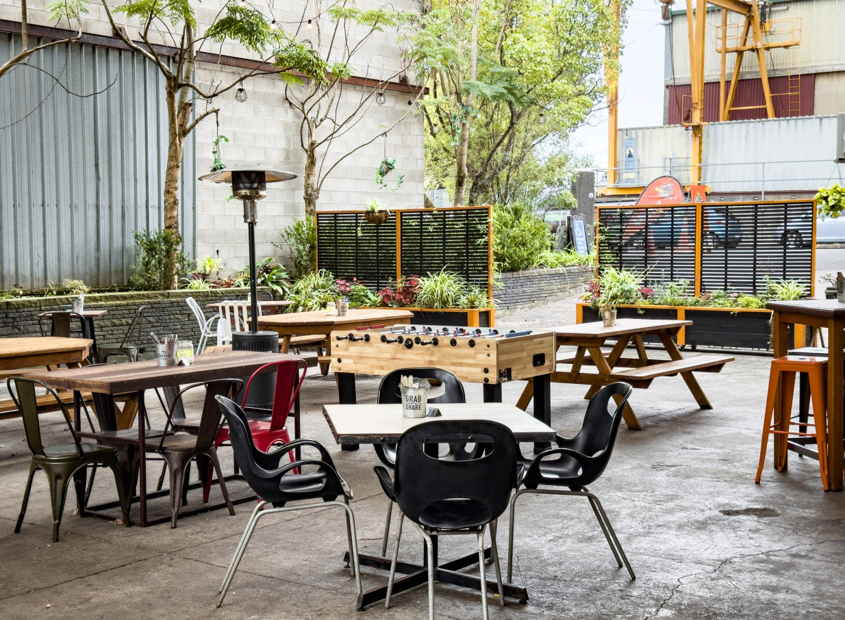 Outdoor seating at WhatABBQ! in New Lynn