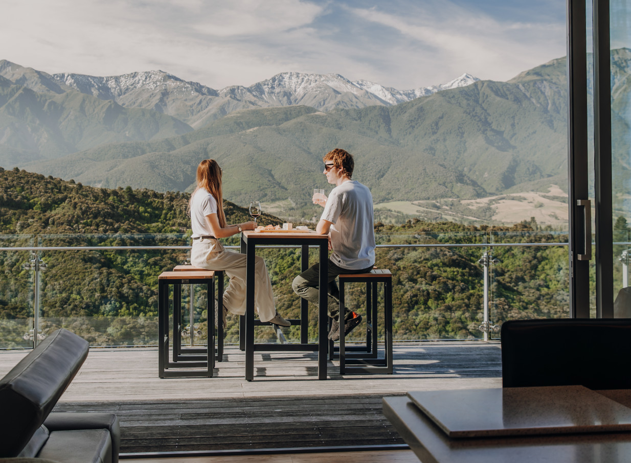 Sundeck with mountain views at Ata Rangi Lodge