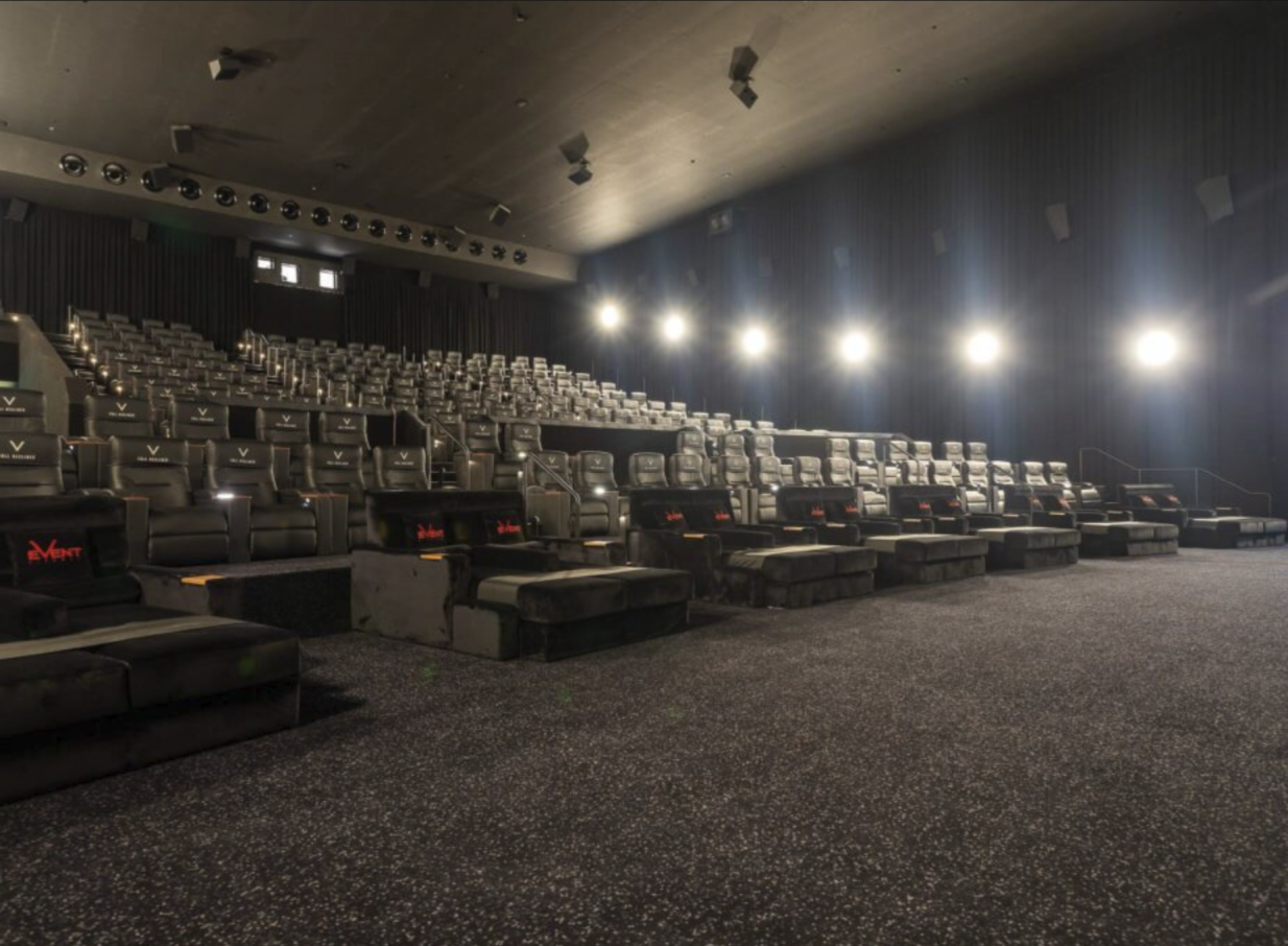 A modern V-Max cinema auditorium with luxurious recliner and daybed seating at Event Cinemas Westfield Newmarket in Auckland.