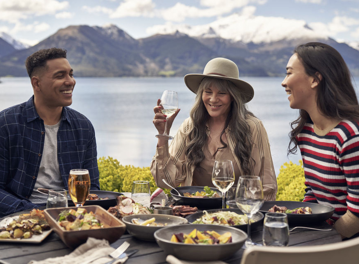An outdoor gourmet BBQ on the colonial-style Walter Peak High Country Farm offers stunning Lake Wakatipu and alpine views.