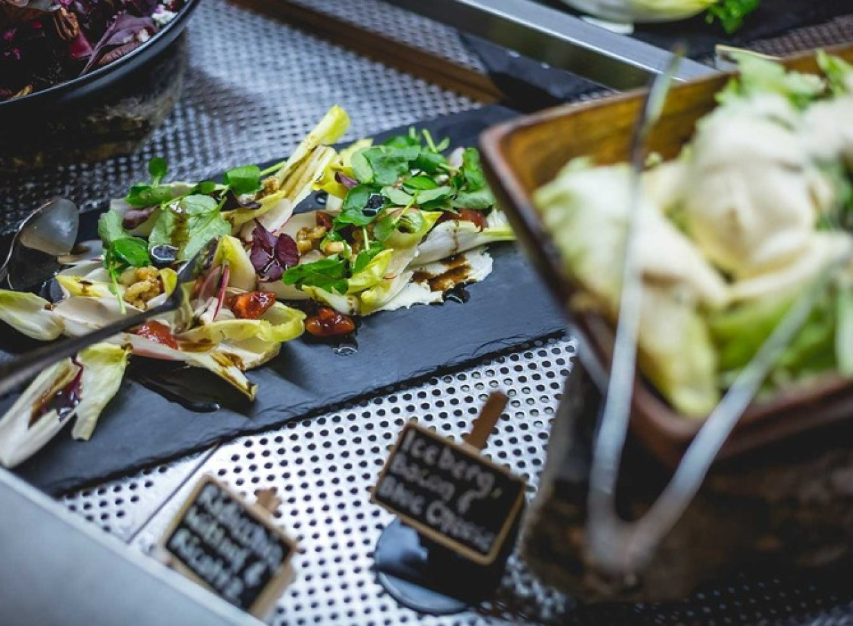 A vibrant salad buffet is featured at the charming colonial Colonel's Homestead Restaurant, TSS Earnslaw & Walter Peak, Queenstown.