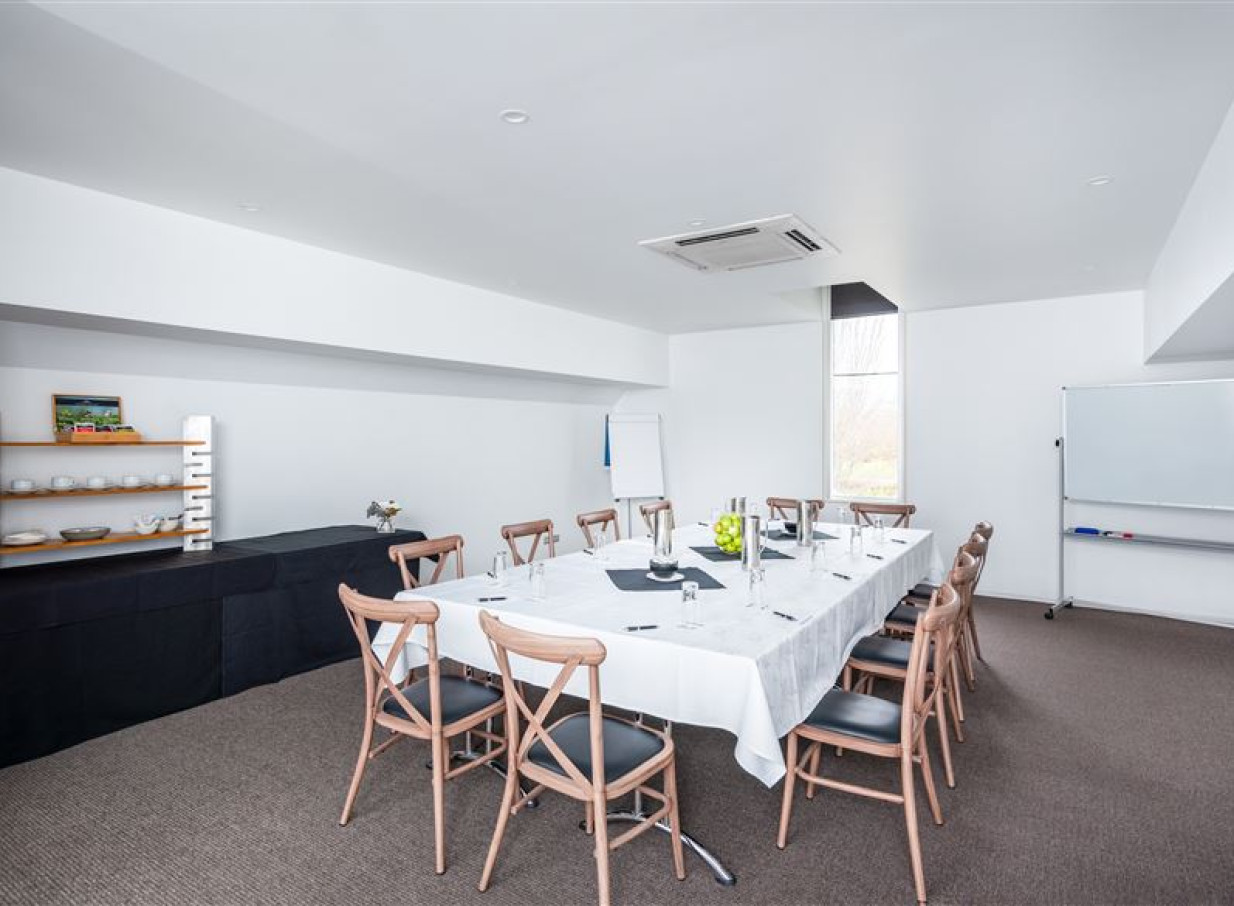 A sleek, contemporary meeting room at Peppers Clearwater, Christchurch, set for a meeting or event.