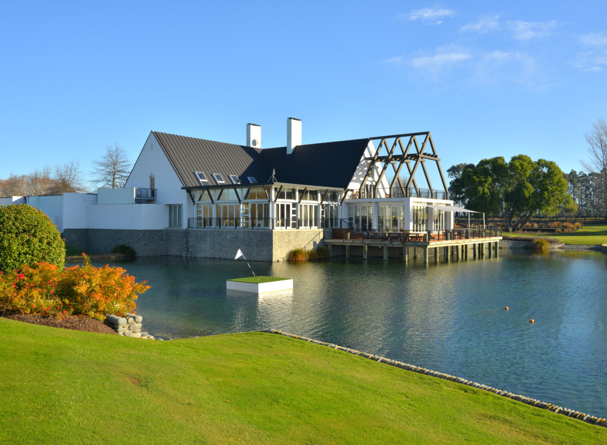 Peppers Clearwater Resort, Christchurch, boasts a contemporary boathouse-style building with a large deck over the tranquil golf course lake.