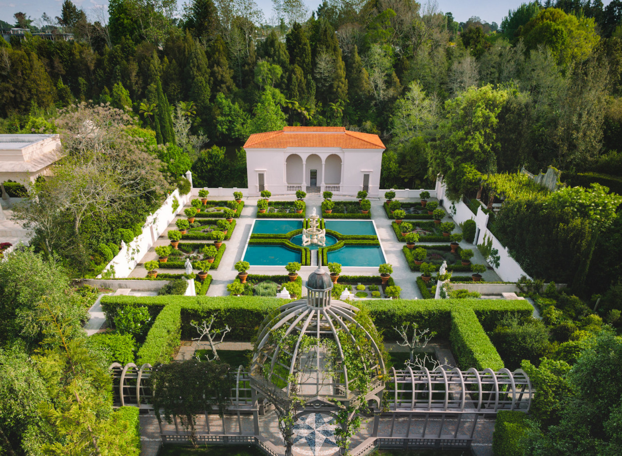 The geometrically designed Italian Renaissance Garden at Hamilton Gardens, Hamilton, features classical architecture, formal hedges, and tranquil pools.