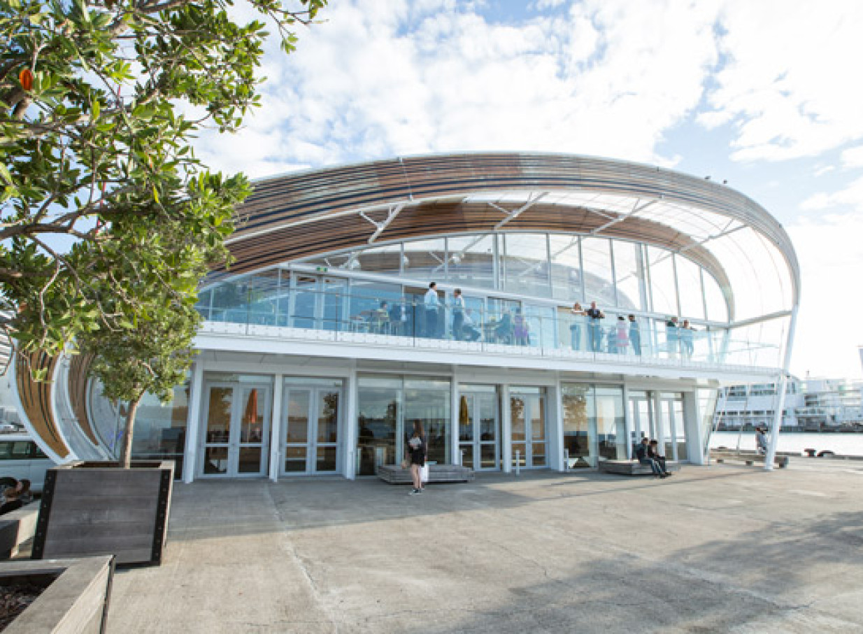 People gather on the balcony of The Cloud, Auckland's iconic modern, cloud-inspired waterfront event venue.