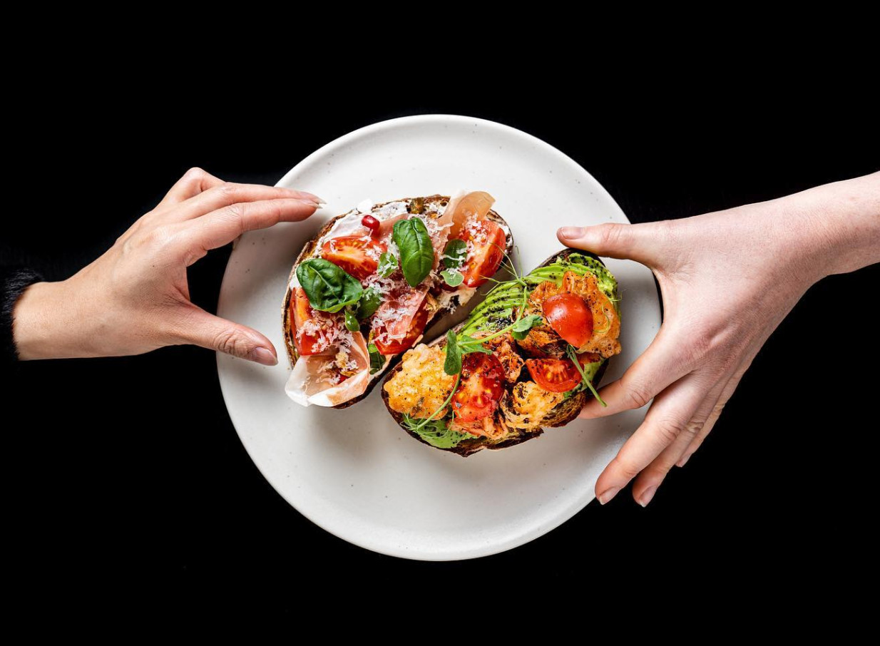 Fresh, seasonal bruschetta is presented by SPECTRA Auckland, a modern cafe and event venue offering thoughtful cuisine.