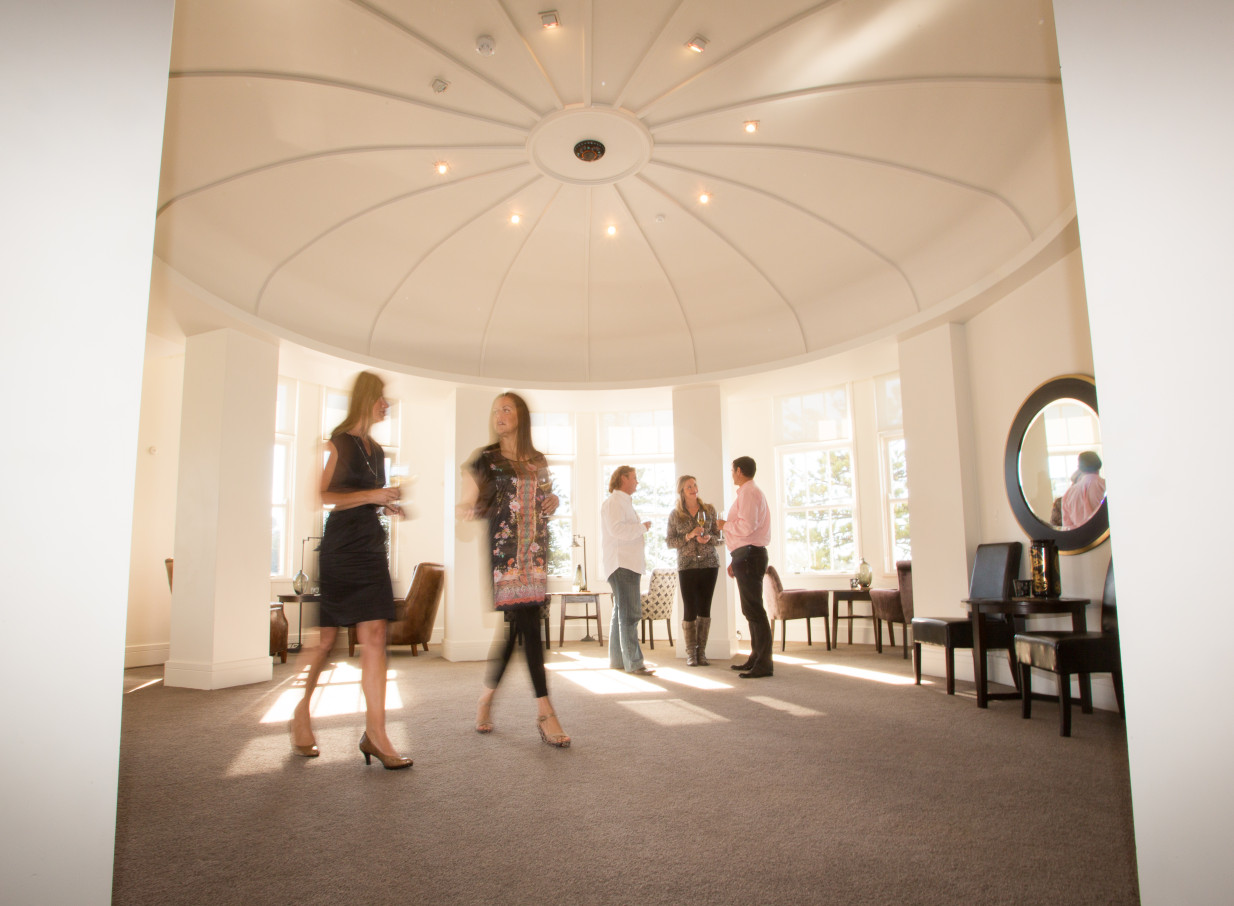 Guests mingle in The Dome, Hawke's Bay's light-filled, Art Deco-inspired circular domed room.