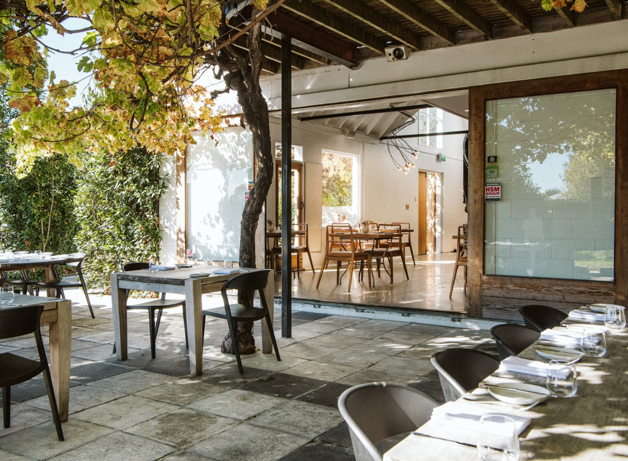 St George's Restaurant in Hawke's Bay offers outdoor dining in its European-inspired, vine-covered courtyard.