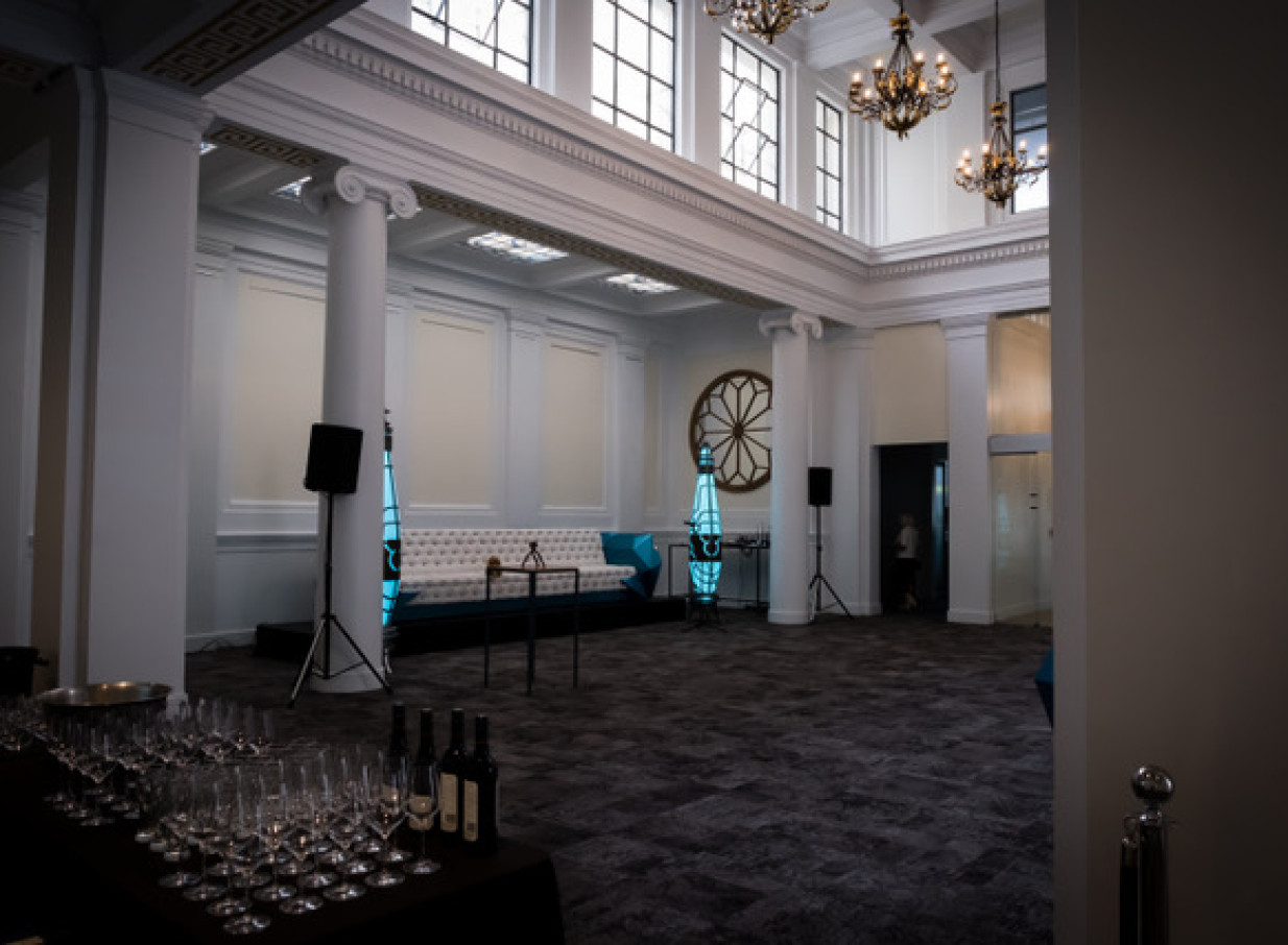 Courtenay Creative, Wellington, presents a grand, renovated historic bank chamber event space, blending classical architecture with modern flair.
